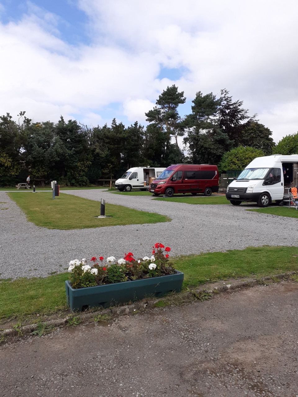 Gravel pitches with flower beds