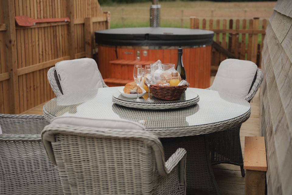 Terrace with hot tub and table