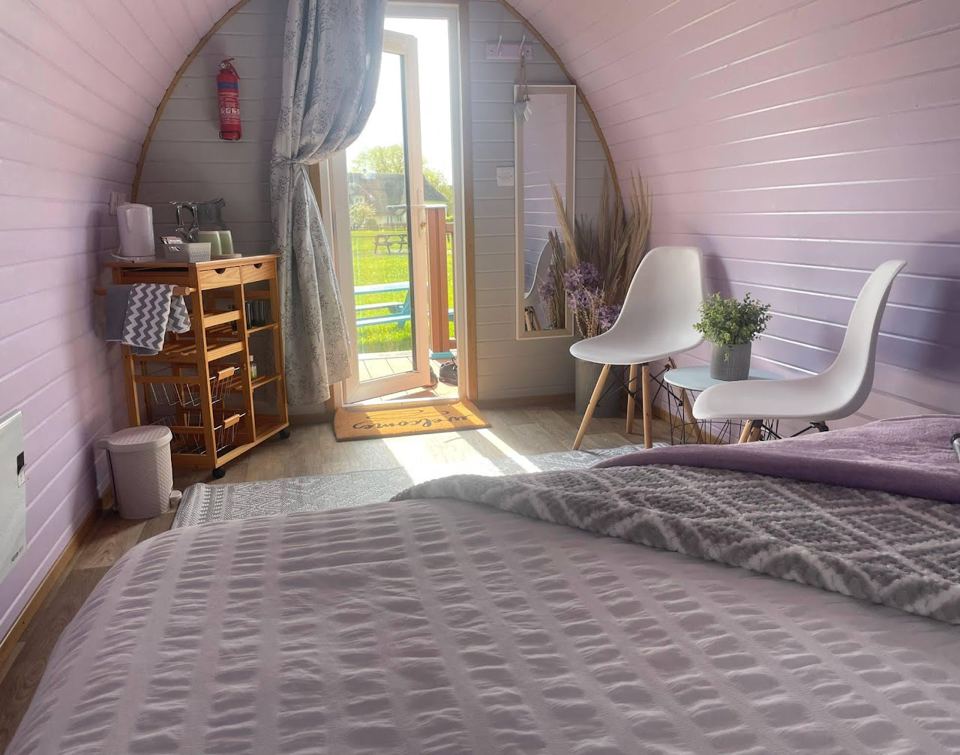 Pod with chairs and door