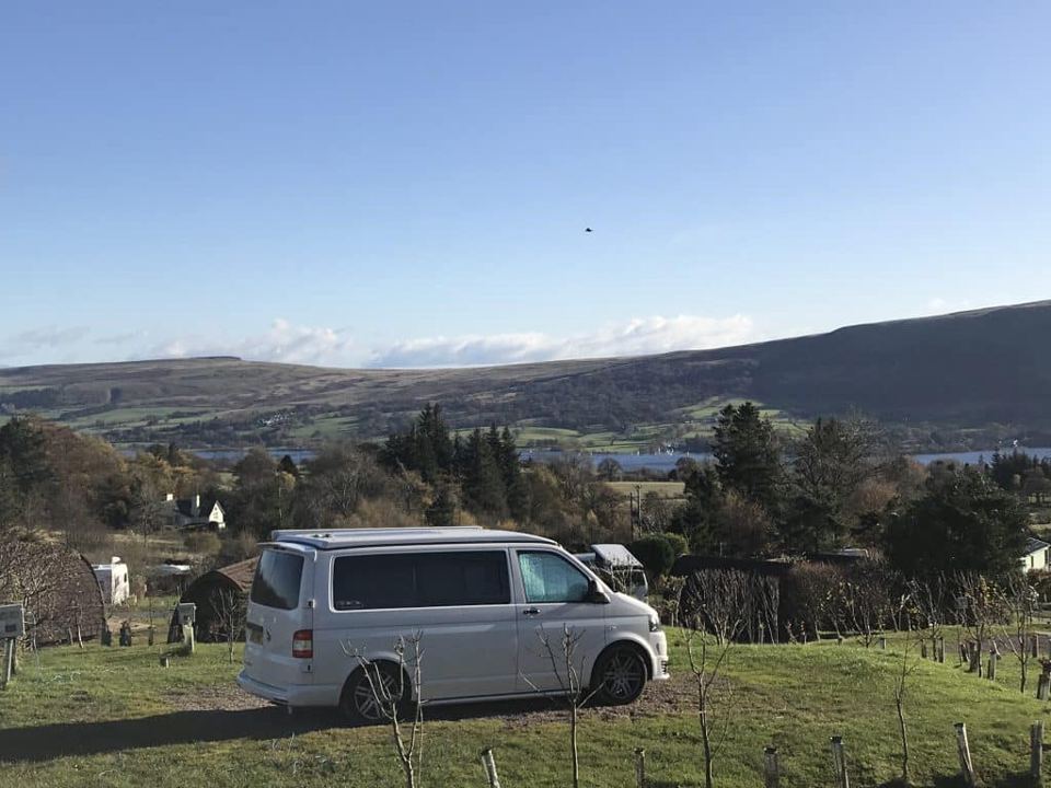Campervan with hills beyond