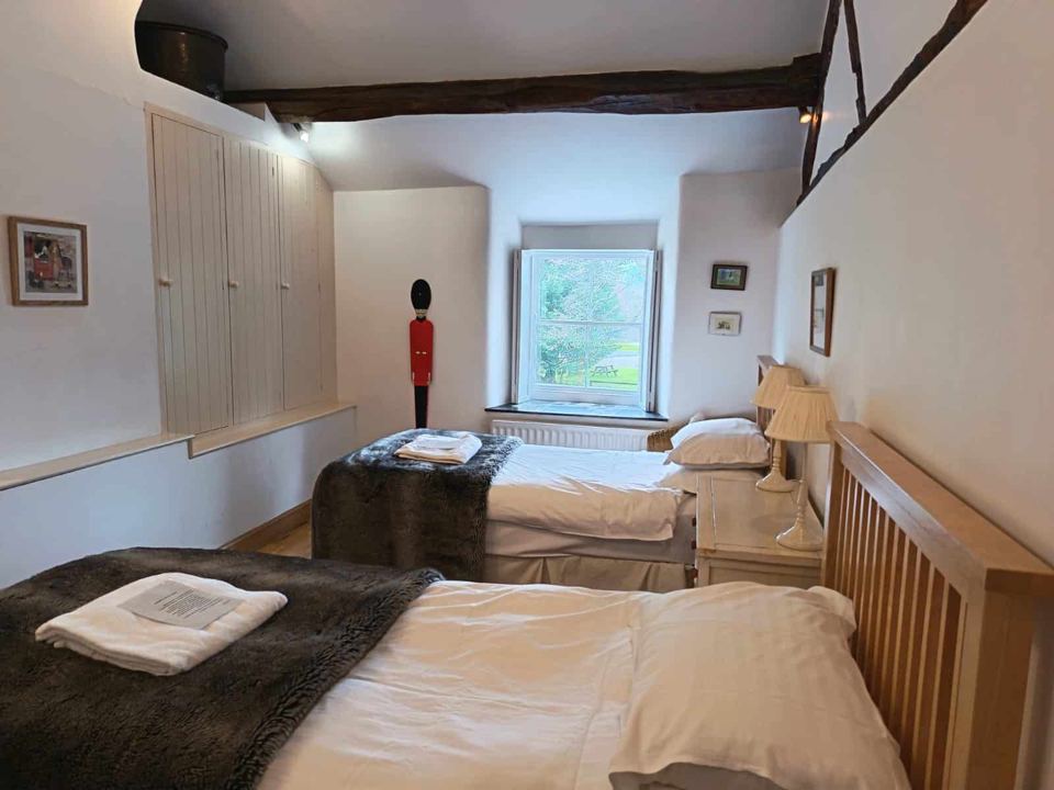 Bedroom with beamed ceiling