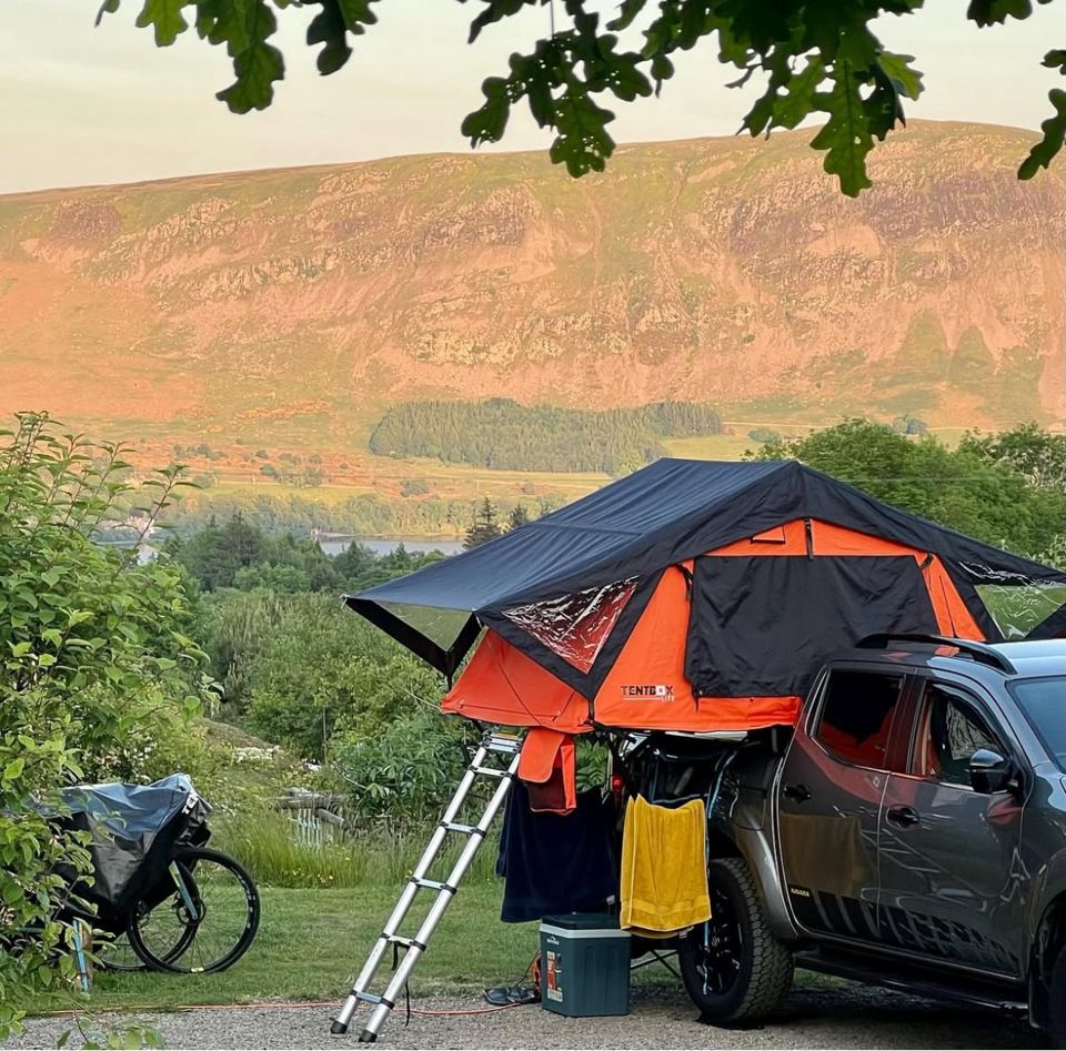 Roof tent on a car below the fells