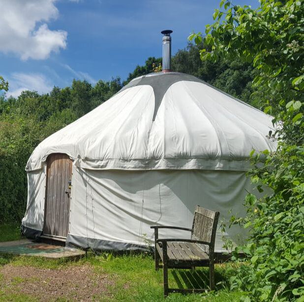 Chimney yurt with bench