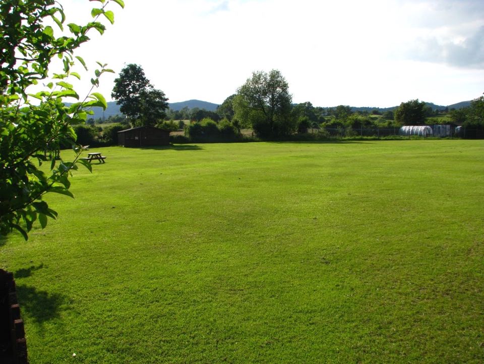 Field with Malvern Hills behind