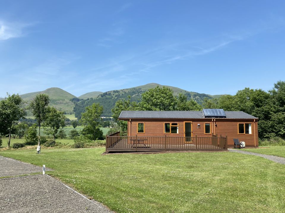 Lodge with hills behind