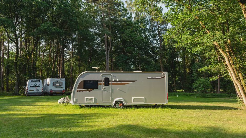 Caravan on grass in the sun