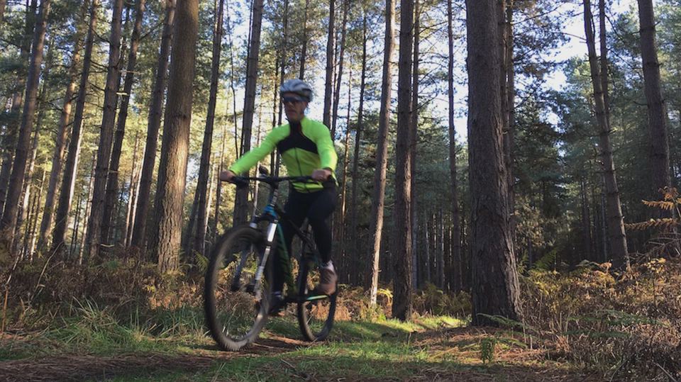 Cyclist on a forest trail