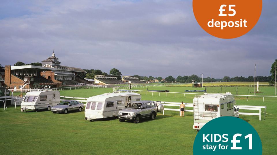 Caravans on the racecourse turf