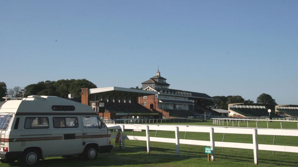 Campervan by the course rails