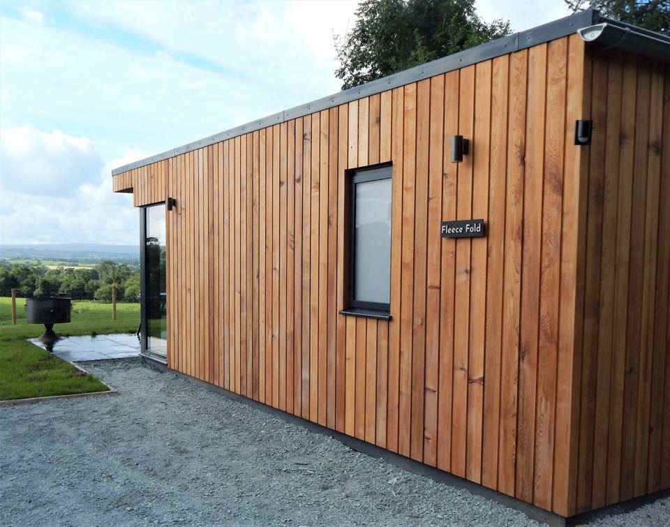 Timber-clad glamping lodge