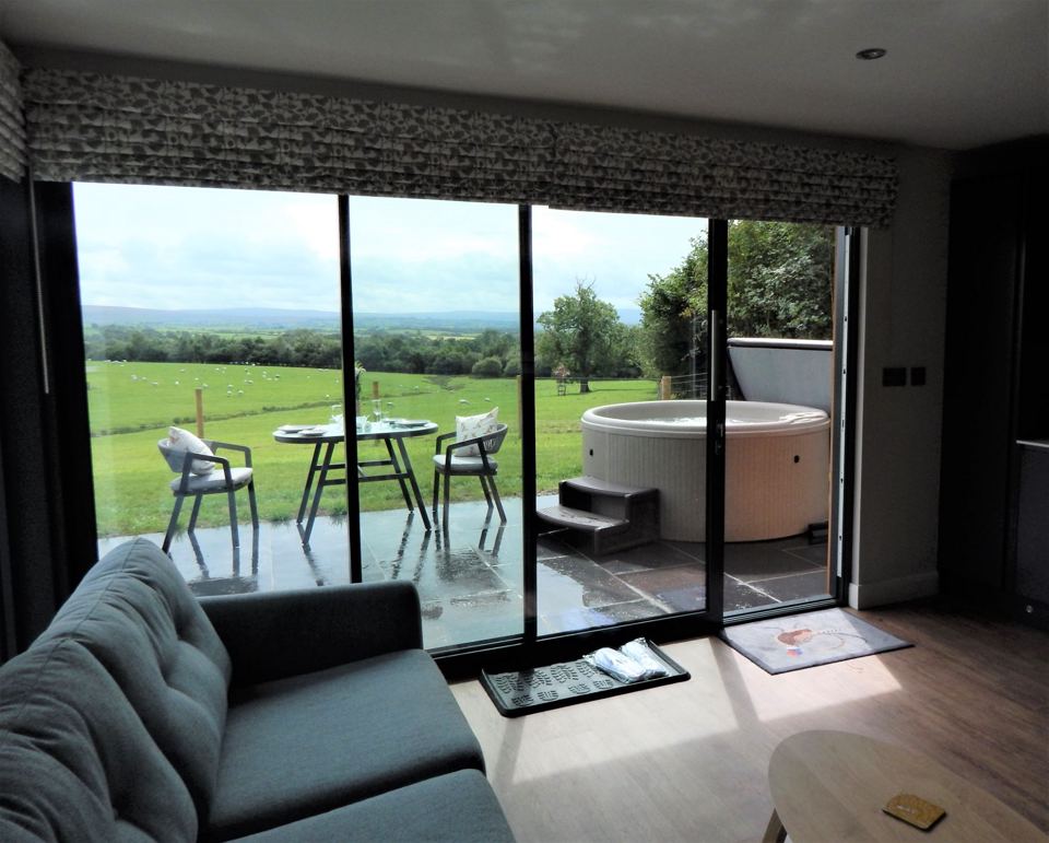 Lodge lounge opening to hot tub terrace
