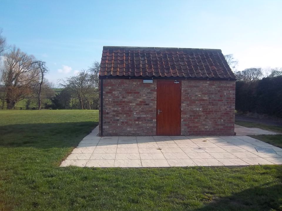 Toilet and shower block