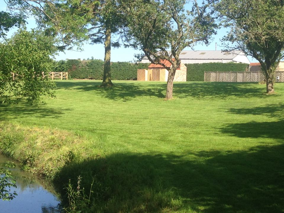 Stream beside the grass pitches