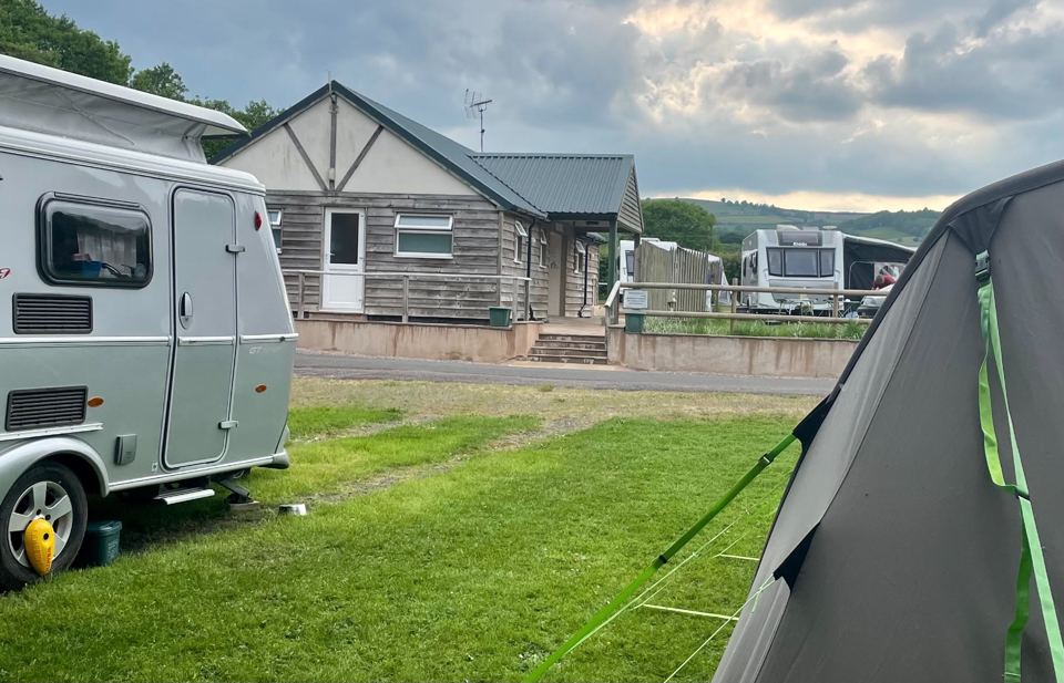 Tent and caravan by the facilities