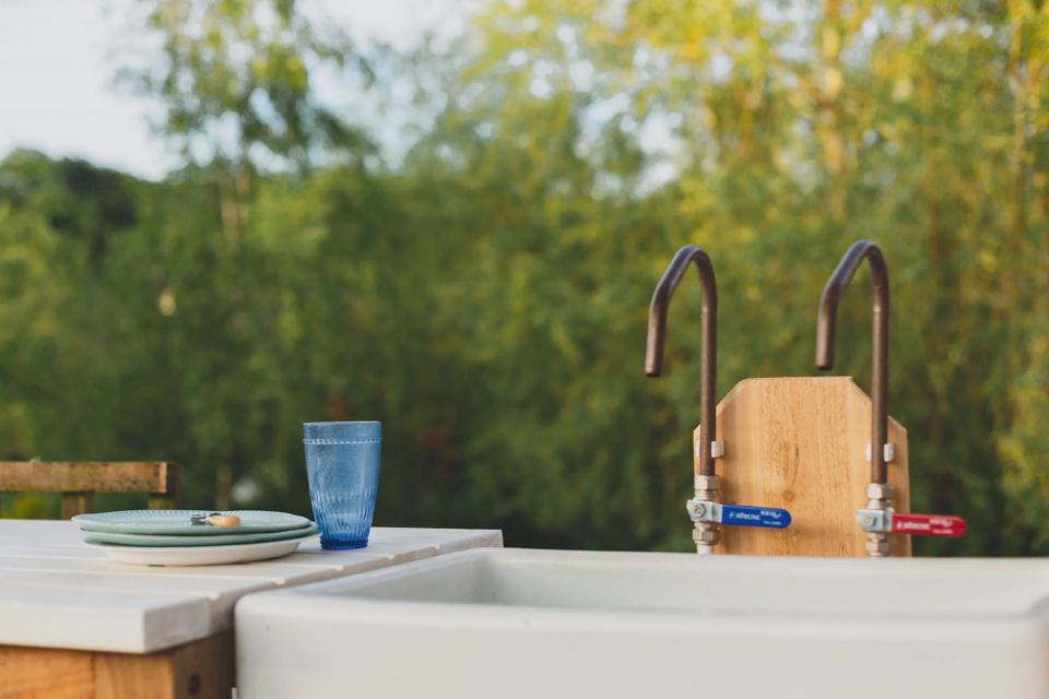 Outdoor sink with brass taps