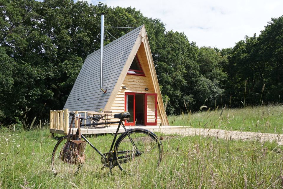 A-frame cabin with a bicycle