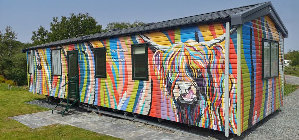 Painted Highland cow caravan