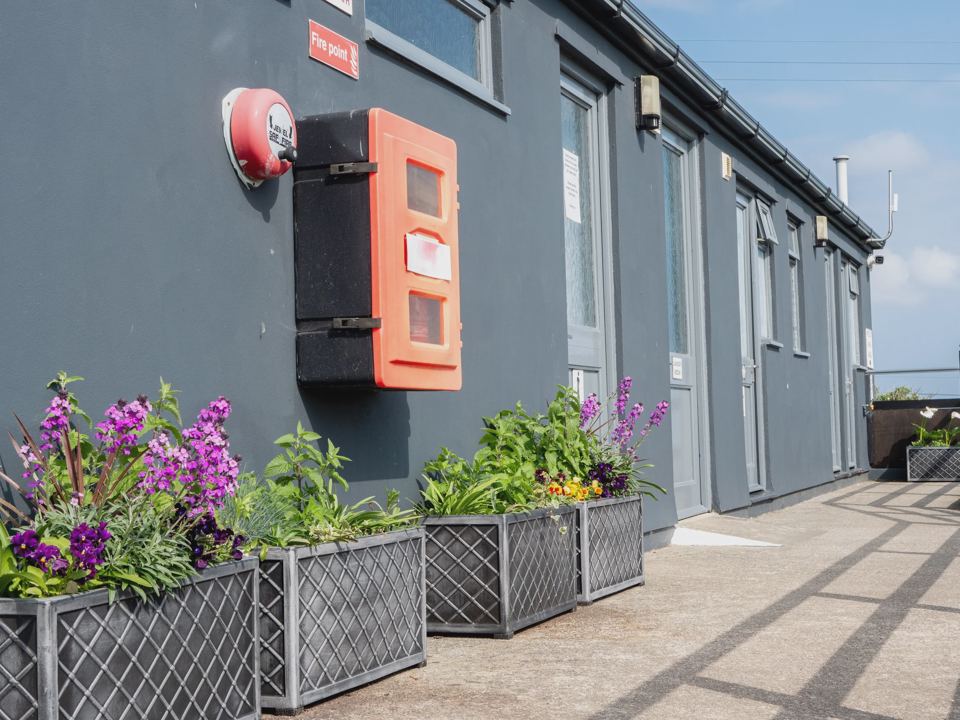 Toilet block with planters