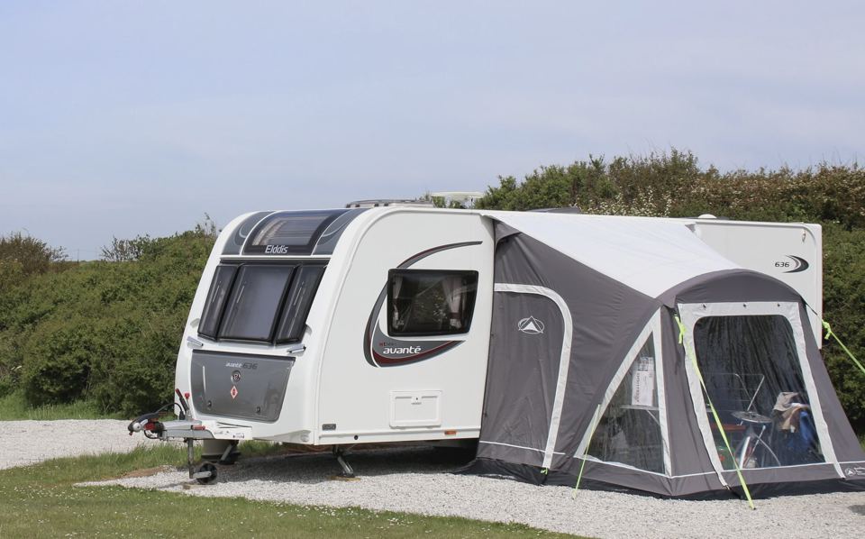 Caravan and awning on gravel