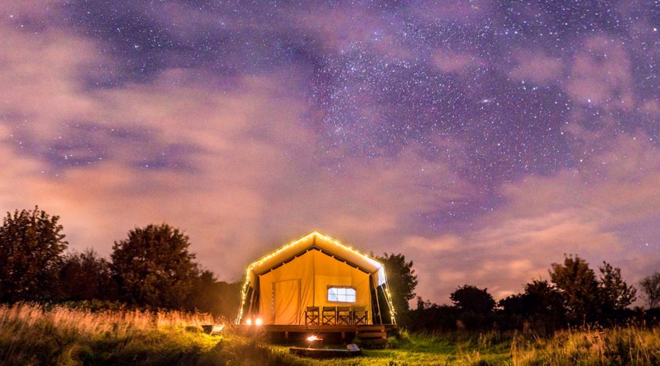 Safari lodge lit at night