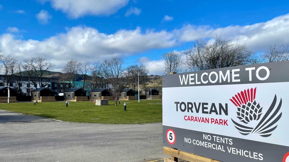 Park entrance and grass pitches