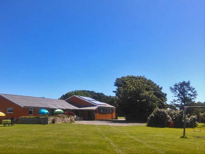Amenity building in the grass field