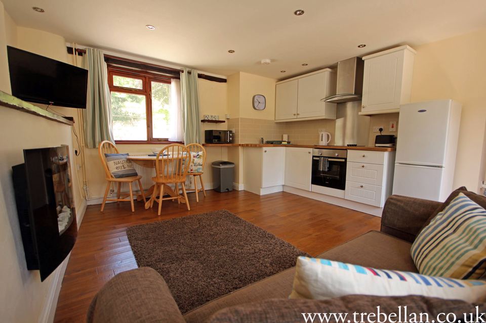 Lounge with kitchen beyond