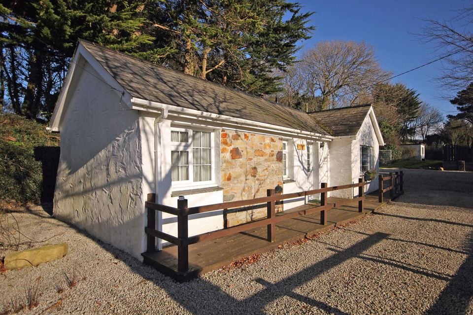 Stone cottage with decking and gravel