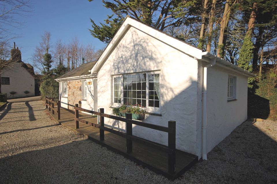 White cottage on the gravel