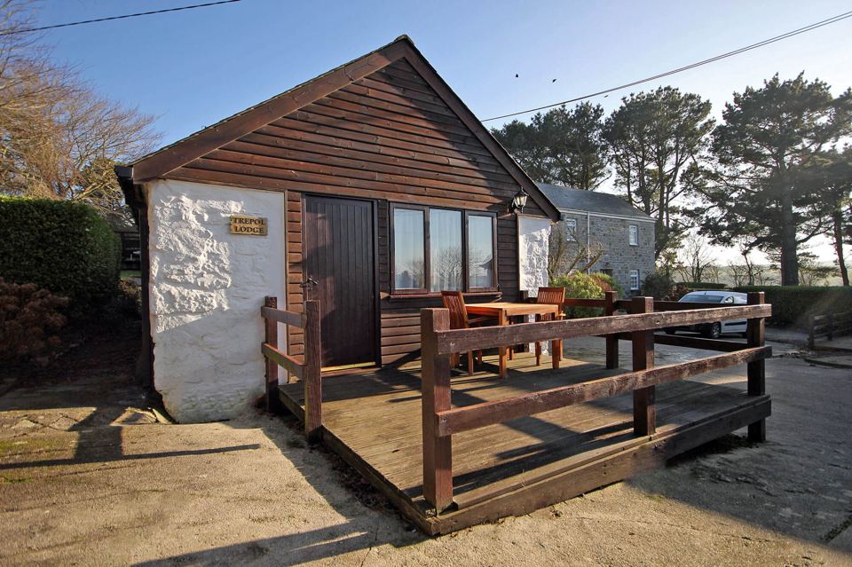 Cottage with decking and garden