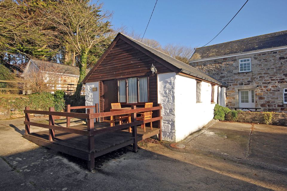 Cottage with decking in the sun