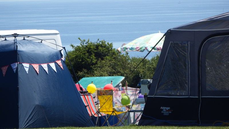 Tents on the clifftop field