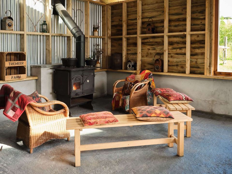 Barn interior with wood burner