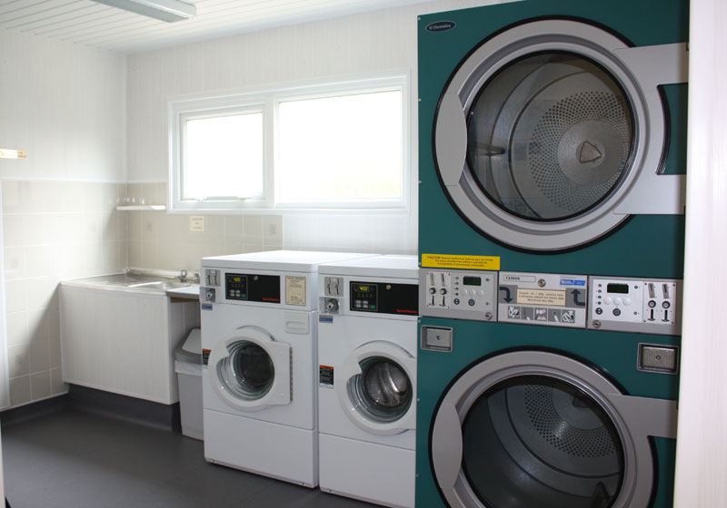 Laundry room with washers and dryers
