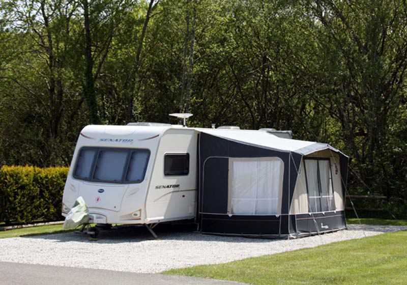 Caravan on the gravel pitch