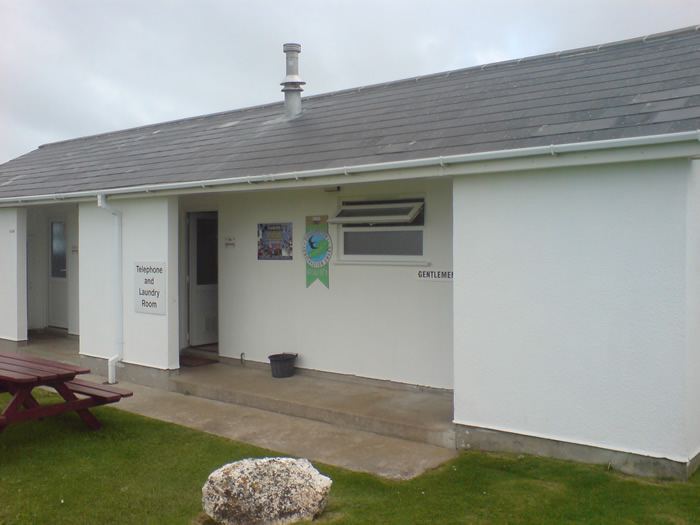 Toilet block with picnic bench