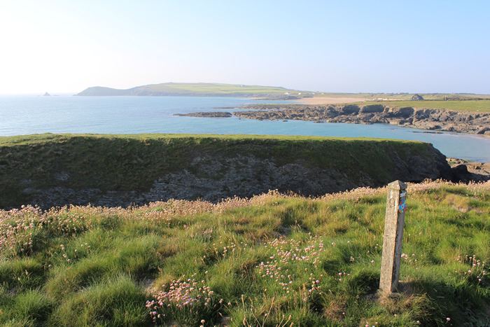 Headland and bay with a post