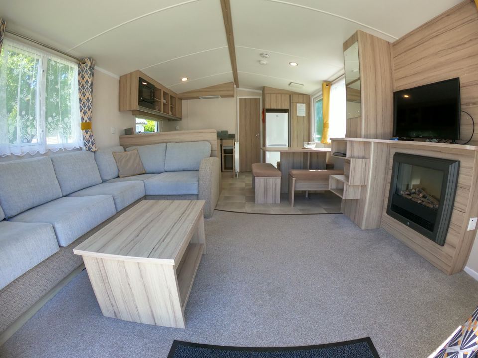 Lounge with fireplace and sofas