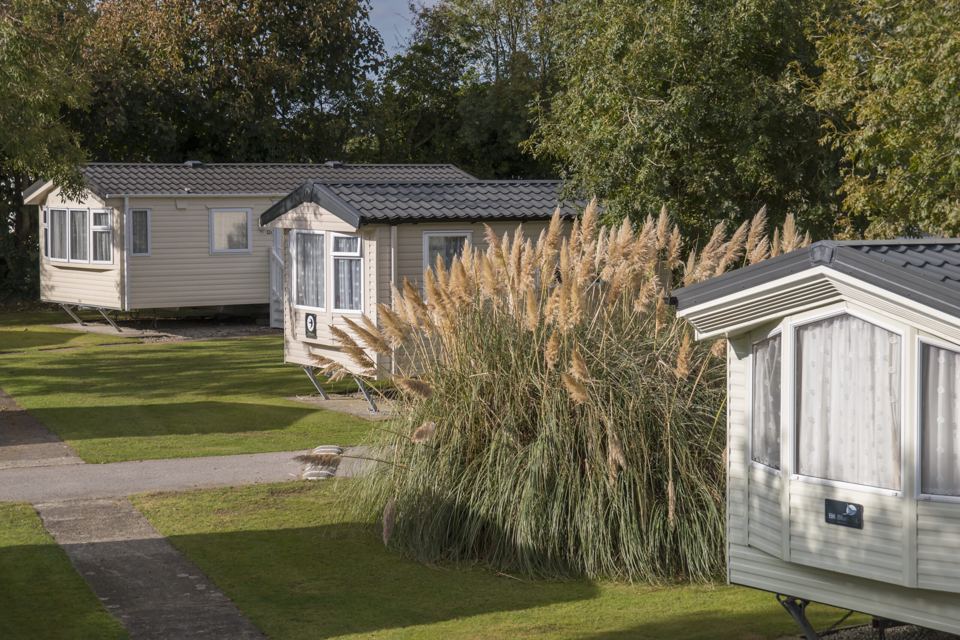 Static caravans among the grasses