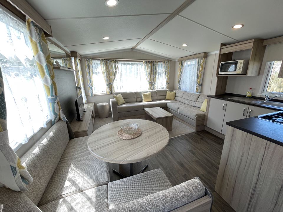 Caravan living room with dining table
