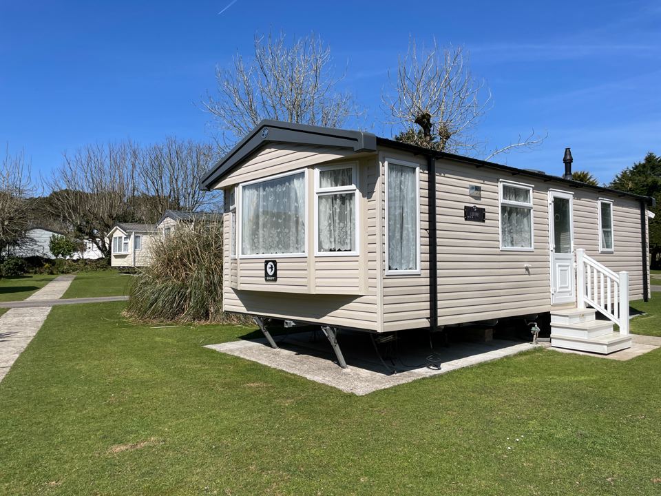 Static caravan on the lawn