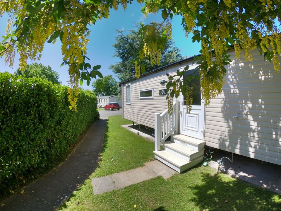 Static caravan on the garden path