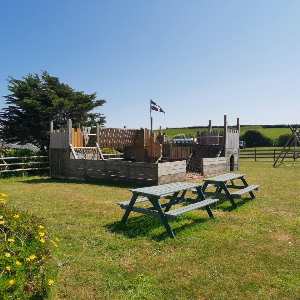 Picnic table by the field