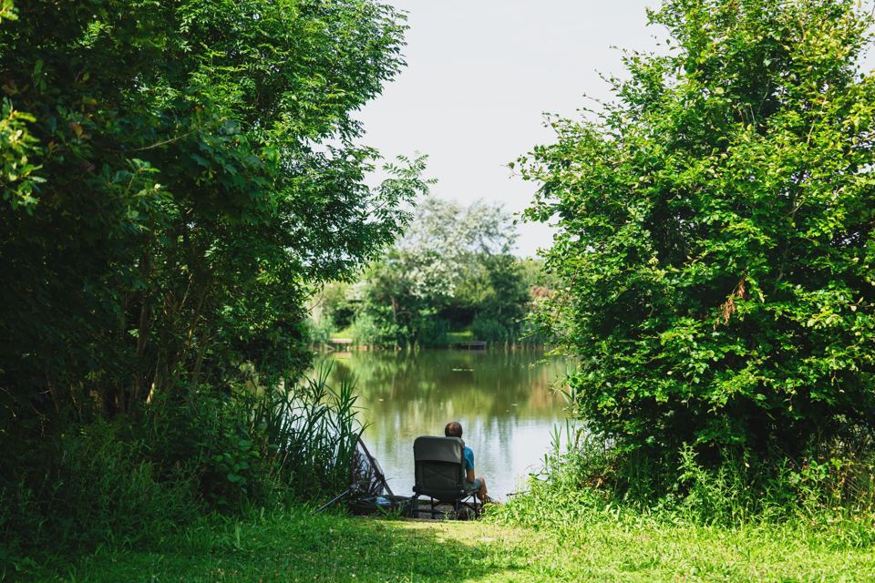 Angler by the lake