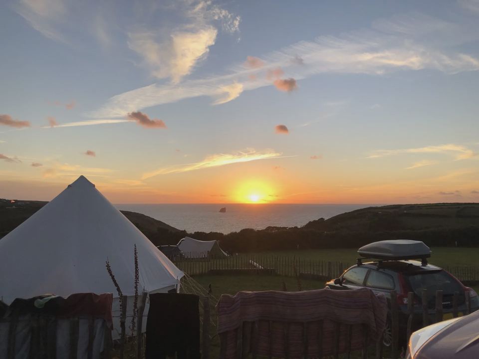 Bell tent at sunset by the sea
