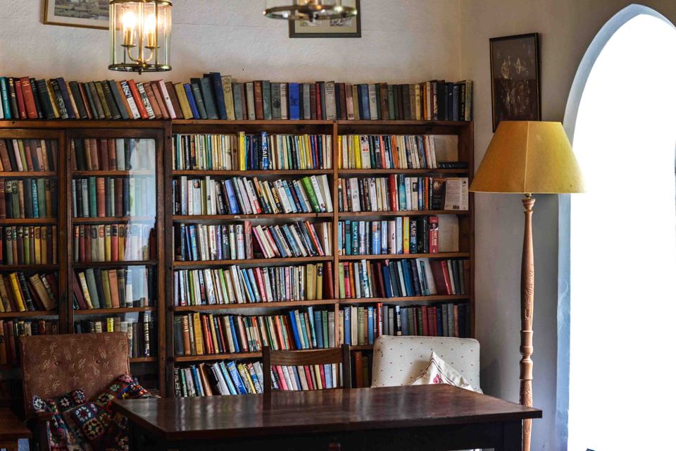 Library with books and a lamp