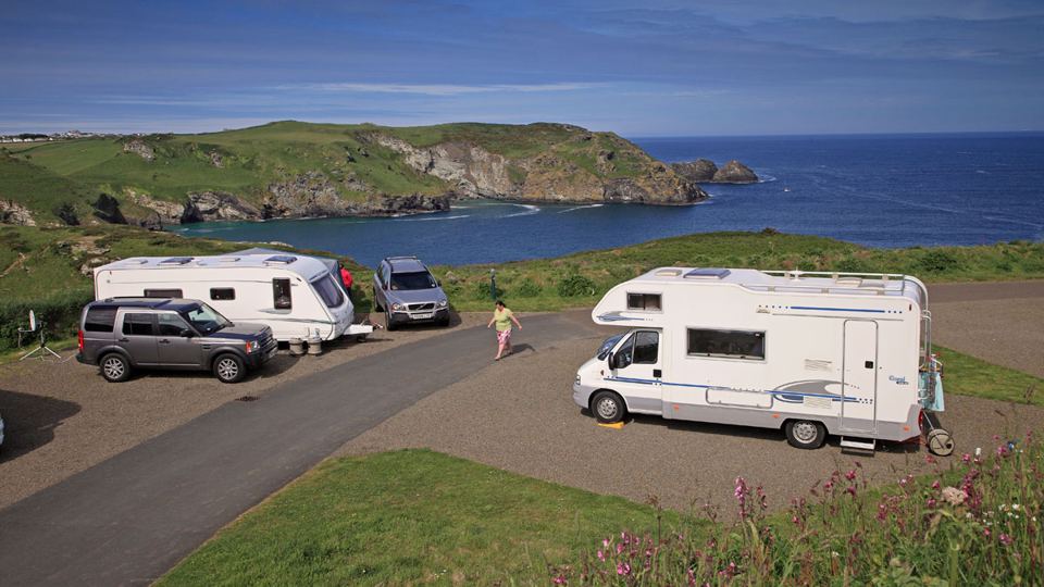 Motorhomes on the road above the cove