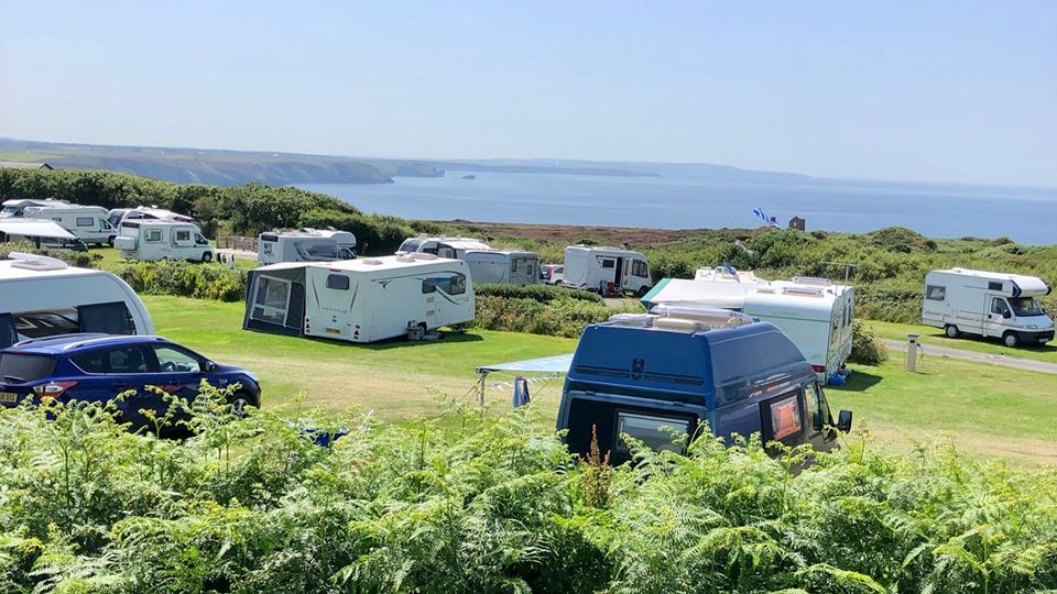 Caravans on the grass by the sea