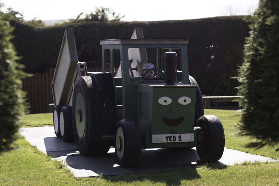 Tractor sculpture in the play area