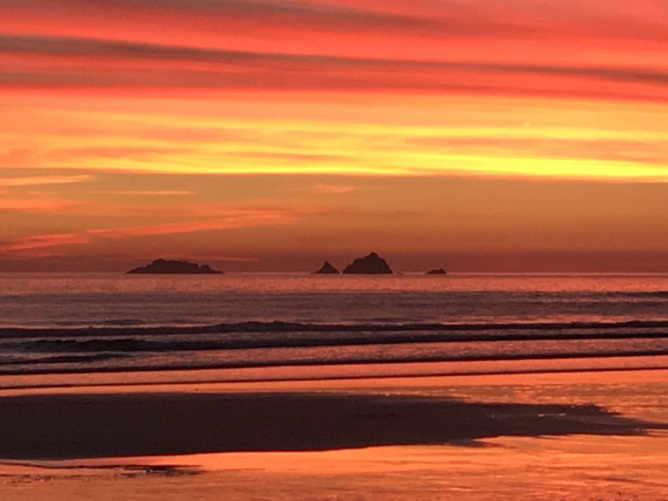 Sunset over the sea and rocks